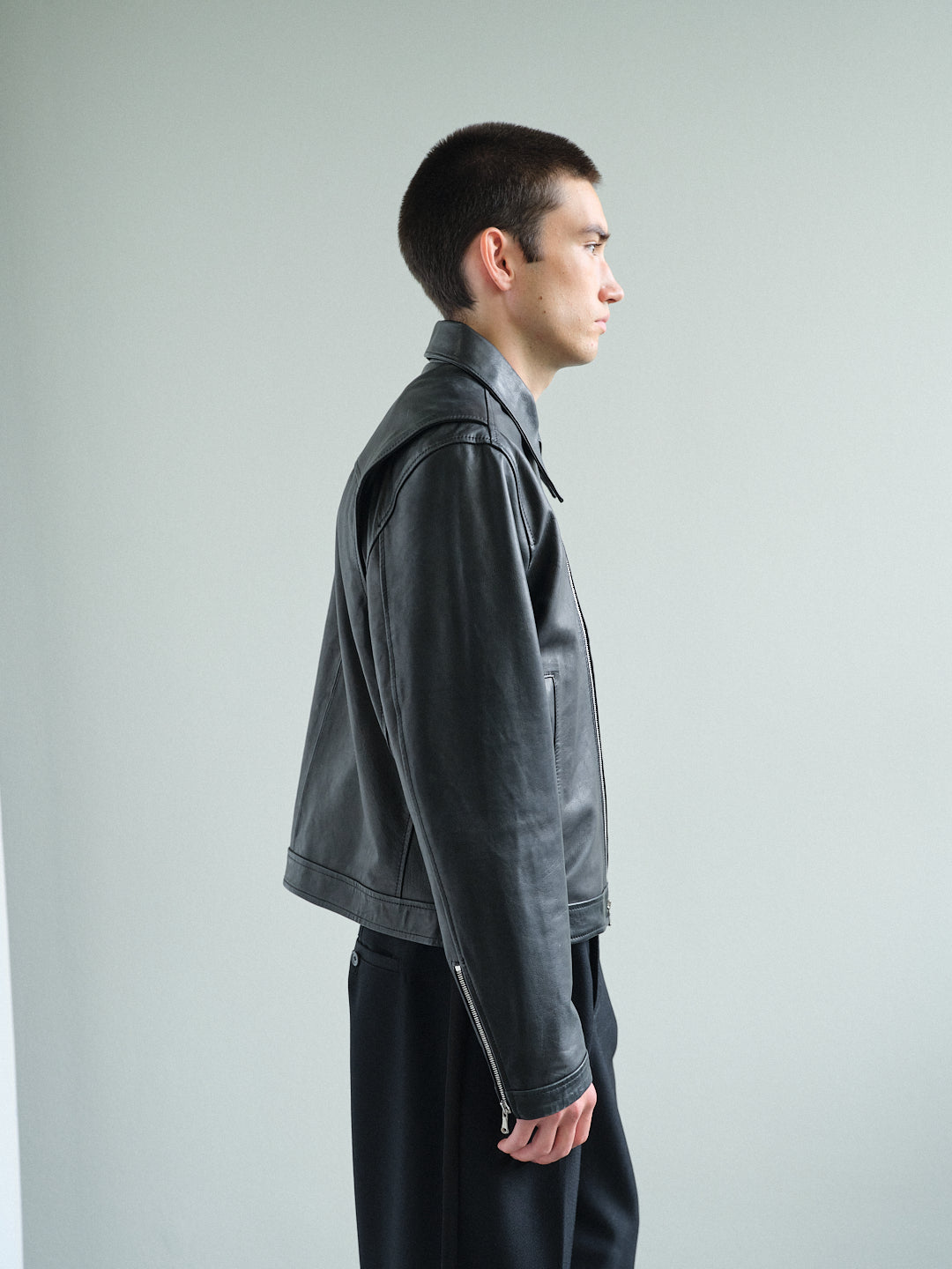 CURVED-ZIP NAPPA LEATHER JACKET in black