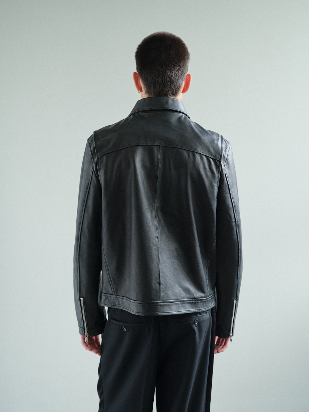 CURVED-ZIP NAPPA LEATHER JACKET in black