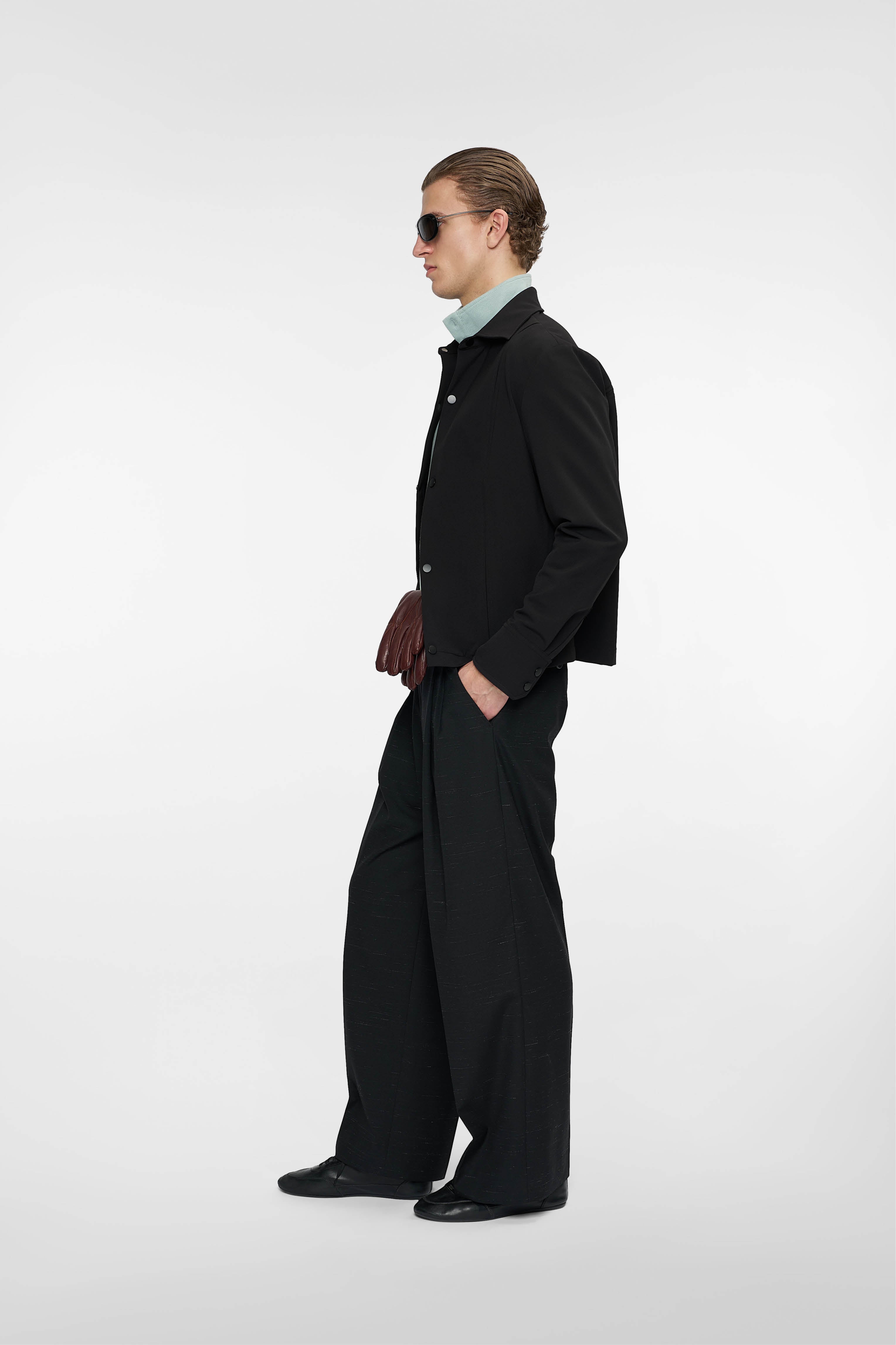 DOUBLE PLEATED TROUSERS in black mélange – O. FILES